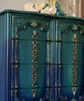 Midnight Green Silk All-In-One paint is perfect for painting kitchen cabinets, bathroom cabinets and painting furniture. Dark green and Blue Ombre painted dresser with gold accents on the scrolls. Staged with some white roses on top.