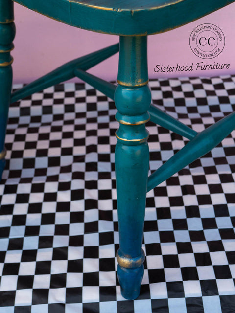 Mirage Silk All-In-One paint is perfect for painting kitchen cabinets, bathroom cabinets and painting furniture. Blue Green Silk All-In-One paint Chair with gold around the legs.
