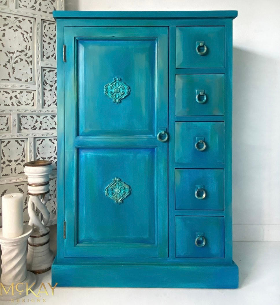 Oasis Silk All-In-One paint is perfect for painting kitchen cabinets, bathroom cabinets and painting furniture. Blue chalk painted dresser. Staged with white candle sticks.