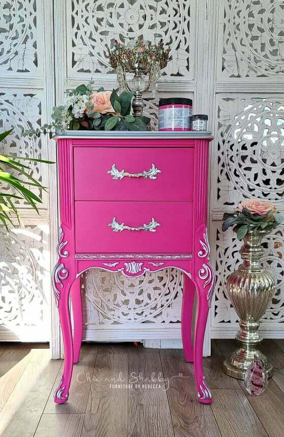 Prickly Pear Silk All-In-One paint is perfect for painting kitchen cabinets, bathroom cabinets and painting furniture. Pink chalk painted end table with silver painted on the trim and hardware. Staged with florals and the paint jars on top.