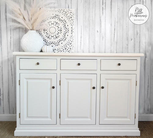 Salt Water Silk All-In-One paint is perfect for painting kitchen cabinets, bathroom cabinets and painting furniture. White painted buffet with bronze knobs.