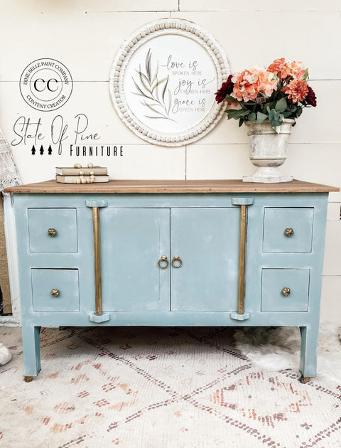 Serenity Silk All-In-One paint is perfect for painting kitchen cabinets, bathroom cabinets and painting furniture! A hutch painted in serenity with gold accents and natural wood top.