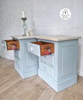 Serenity Silk All-In-One paint is perfect for painting kitchen cabinets, bathroom cabinets and painting furniture! Twin bedside tables painted in serenity with a light wooden top and a transfer on the side of the drawers.