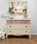 Sun Kissed Silk All-In-One paint is perfect for painting kitchen cabinets, bathroom cabinets and painting furniture.
Dresser painted in Sun Kissed Silk All-in-one with the top 2 drawer with a light brown wood finish as well as the base. Staged with a white mirror hanging above dresser.