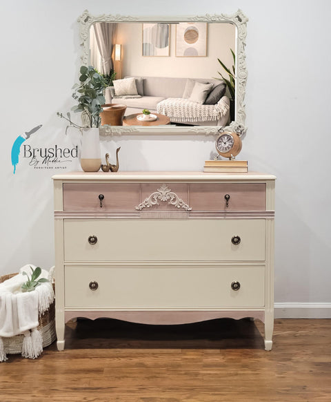 Sun Kissed Silk All-In-One paint is perfect for painting kitchen cabinets, bathroom cabinets and painting furniture.
Dresser painted in Sun Kissed Silk All-in-one with the top 2 drawer with a light brown wood finish as well as the base. Staged with a white mirror hanging above dresser.