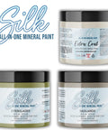 Image of a 16 oz. Extra Coat, a 16 oz. Everglades Silk Paint, and a 16 oz. Badlands Silk Paint. Silk All-In-One Mineral Paint logo is in the top left corner.