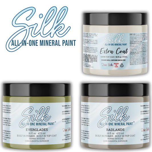 Image of a 16 oz. Extra Coat, a 16 oz. Everglades Silk Paint, and a 16 oz. Badlands Silk Paint. Silk All-In-One Mineral Paint logo is in the top left corner.