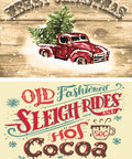 Image of Snowed In decoupage paper. The top half is a red truck stuck in show, with a Christmas tree in the bed of the truck with the words Merry Christmas above the truck. The bottom half reads "Old Fashioned Sleigh Rides and Hot Cocoa On the Farm" with snowflakes and a cup of hot chocolate with 50 cents written on the mug.