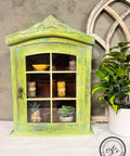 Daffodil Terra Clay Paint provides endless possibilities for your imagination and can be used on wood, canvas, tile, fabric and more! This hanging decor shelf is painted in daffodil at the base and then highlighted with blue on the edges to make this worn effect making it appear green.