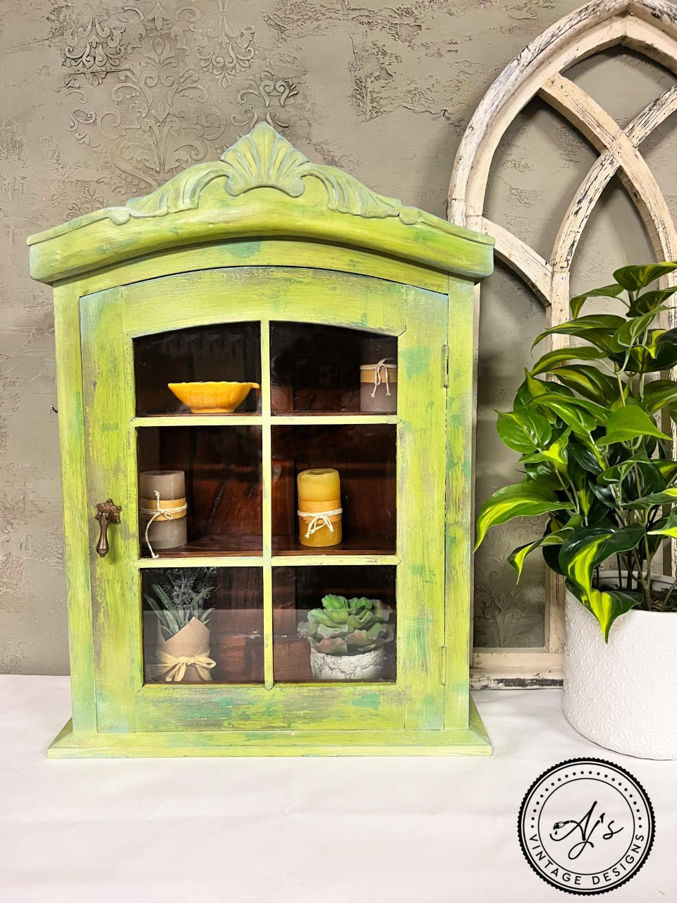 Daffodil Terra Clay Paint provides endless possibilities for your imagination and can be used on wood, canvas, tile, fabric and more! This hanging decor shelf is painted in daffodil at the base and then highlighted with blue on the edges to make this worn effect making it appear green.