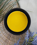 Daffodil Terra Clay Paint provides endless possibilities for your imagination and can be used on wood, canvas, tile, fabric and more! A product image of an open paint can displaying the color daffodil terra clay paint.