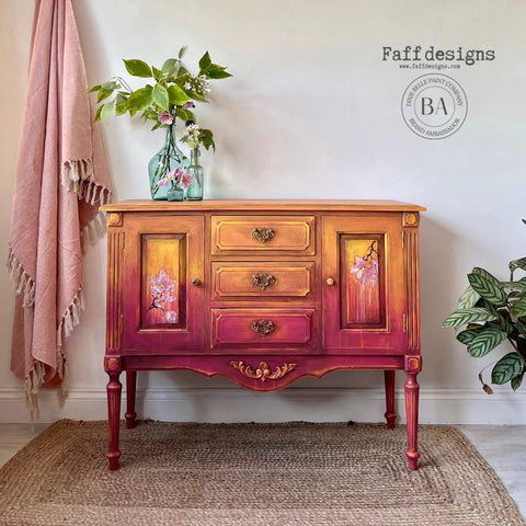 Marigold Terra Clay Paint provides endless possibilities for your imagination and can be used on wood, canvas, tile, fabric and more! Pink and orange Terra Clay painted Ombre Dresser with Floral Rub on transfers. Staged with glass vases and plants inside.