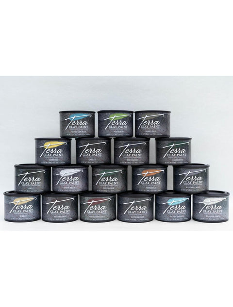 Terra Clay Paint Package 
Image shows all colors in the Terra Clay Artisan Paint line stacked on top of eachother.