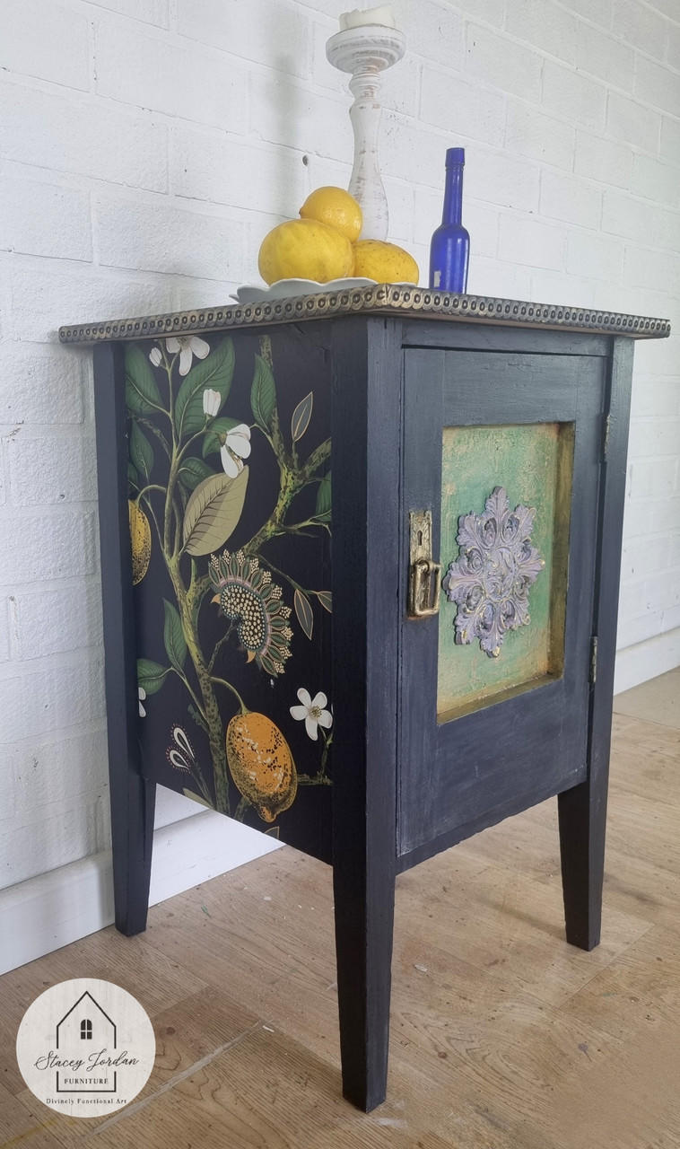 Navy blue painted nightstand with the Vintage Botanical decoupage paper applied on the side.