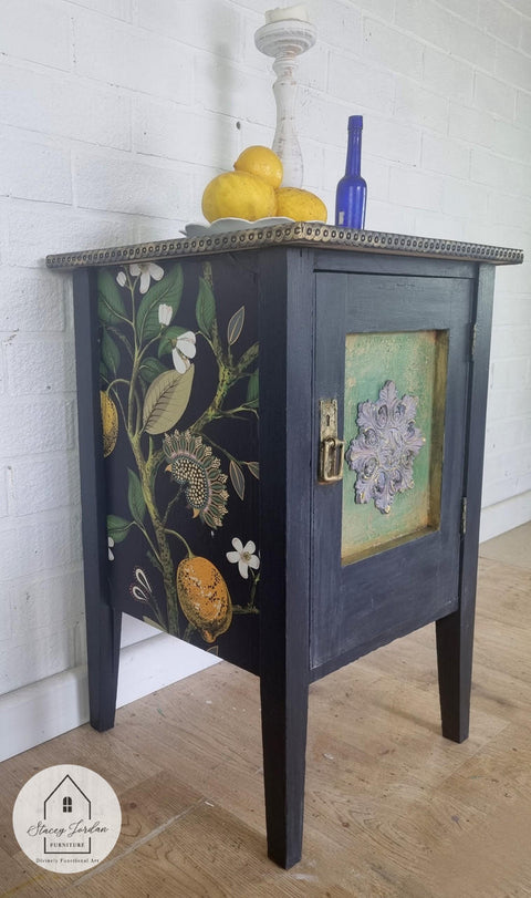 Navy blue painted nightstand with the Vintage Botanical decoupage paper applied on the side.