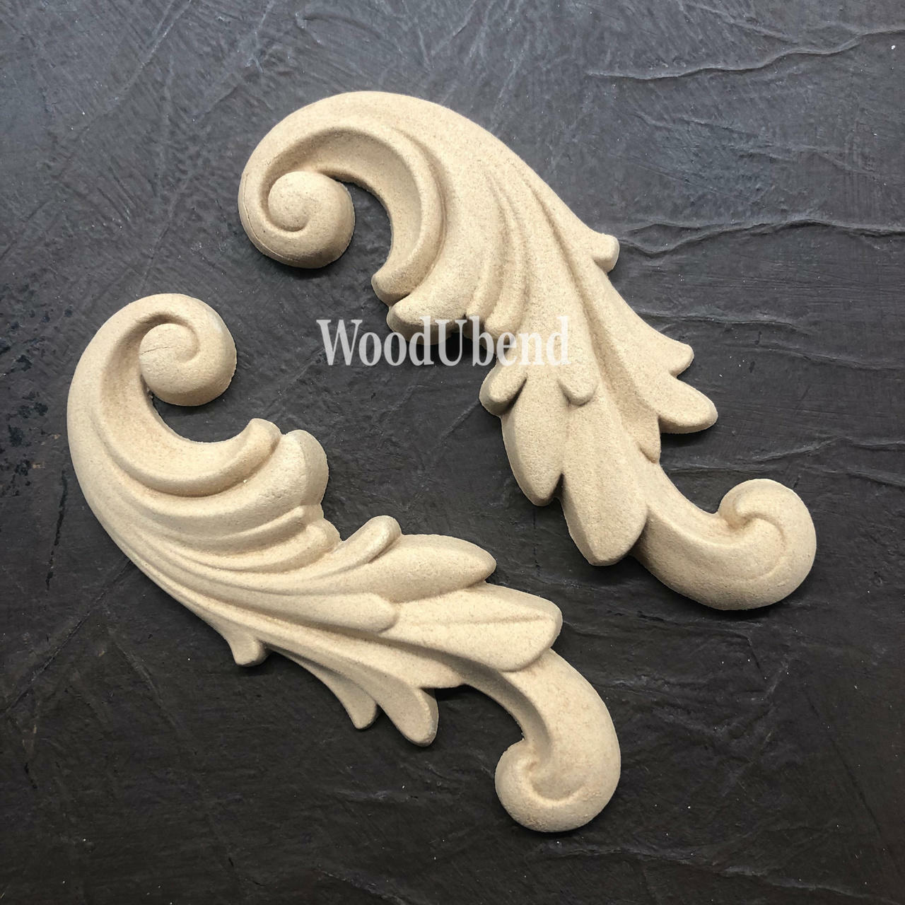 WoodUBend Applique #1320 (set of 2) is the perfect mouldable embellishment for any project! Applique #1320 (set of 2) against black background.