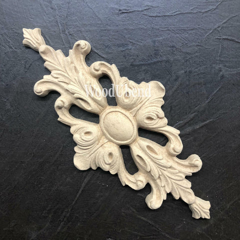 WoodUBend Applique #1339 (Set of 2) is the perfect mouldable embellishment for any project! WoodUBend Applique #1339 (Set of 2) is the perfect mouldable embellishment for any project! Image of one Applique #1339 against black background.