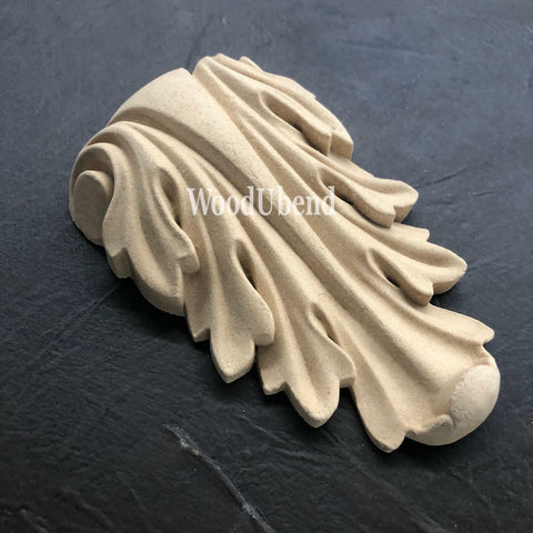 WoodUBend Applique #1361 (Set of 2) is the perfect moludable embellishment for any project! This image shows one Applique #1361 without packaging against a black background.