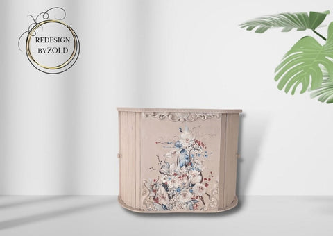 WoodUBend Applique #2150 (Set of 2) is the perfect mouldable embellishment for any project!
A pink bar with the Bohemian Wedding Transfer in the center of the panel. You can see Applique #2150 (Set of 2) on the top trim of the bar. Staged in a white room.