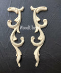 WoodUBend Applique #366-7 (set of 2) is the perfect mouldable embellishment for any project!
The Applique #366-7 (set of 2) set side by side staged on top of a black crinkled background.