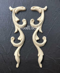 WoodUBend Applique #366-7 (set of 2) is the perfect mouldable embellishment for any project!
The Applique #366-7 (set of 2) set side by side inverted on top of a black crinkled background.