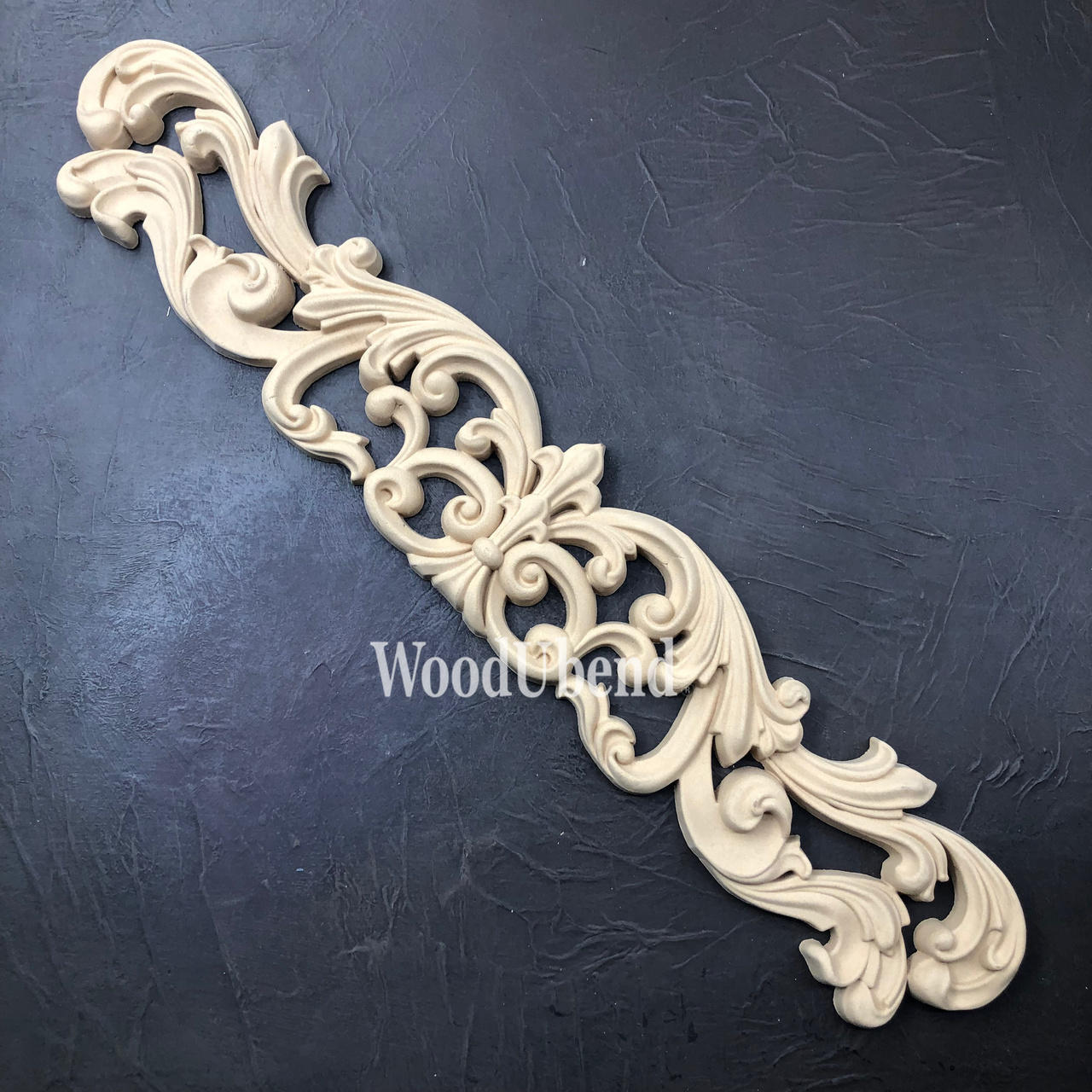 WoodUBend Applique #6035 is the perfect mouldable embellishment for any project!
Applique #6035 against a black background.