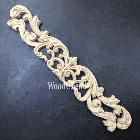 WoodUBend Applique #6035 is the perfect mouldable embellishment for any project!
Applique #6035 against a black background.