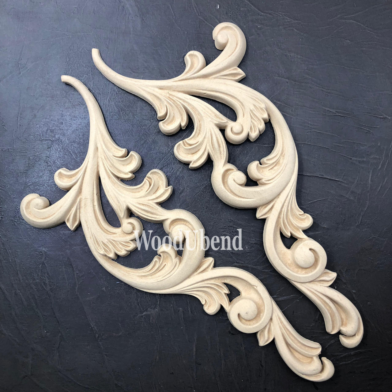 WoodUBend Applique #6068 (set of 2) is the perfect mouldable embellishment for any project! This image shows WoodUBend Applique #6068 (set of 2) against a black background.