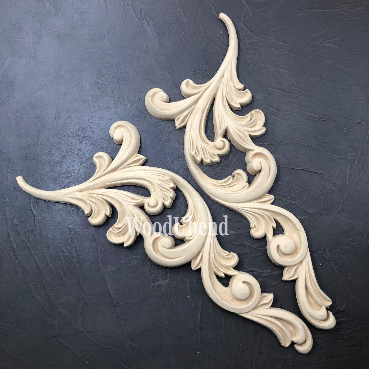 WoodUBend Applique #6068 (set of 2) is the perfect mouldable embellishment for any project! This image shows WoodUBend Applique #6068 (set of 2) against a black background.