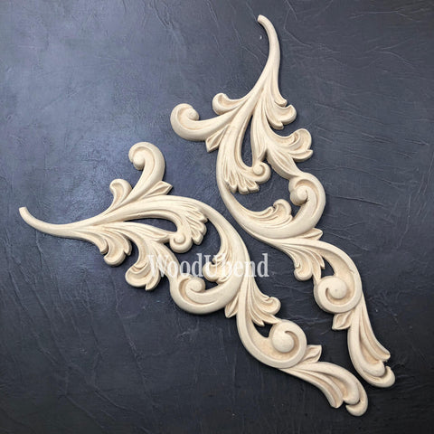 WoodUBend Applique #6068 (set of 2) is the perfect mouldable embellishment for any project! This image shows WoodUBend Applique #6068 (set of 2) against a black background.