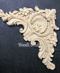 WoodUBend Corner Applique #1354.29 (Set of 2) is the perfect mouldable embellishment for any project!
This is a wood corner applique that can be secured to any piece of furniture.  This applique had a fan in the center and two flowers on either side of the fan.  It has a Victorian look with lots of "gingerbread" frills all over the corner applique.  This applique is resting on top of black leather.