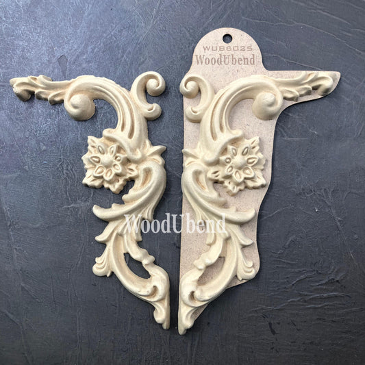 WoodUBend Corner Applique #6025 (set of 2) is the perfect mouldable embellishment for any project!
There are two corner woo-u-bend moldings resting on black leather.  One is out of the packaging and the other is still in the packaging.  They are facing away from each other.  They would be perfect for any DIY furniture project.