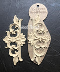 WoodUBend Fleur-de-lis Applique #2092 (set of 2) is the perfect mouldable embellishment for any project!
There are two Fleur-de-lis Appliques in this picture.  One is out of the packaging and one is still in the packaging.  They are staged on black, leather.