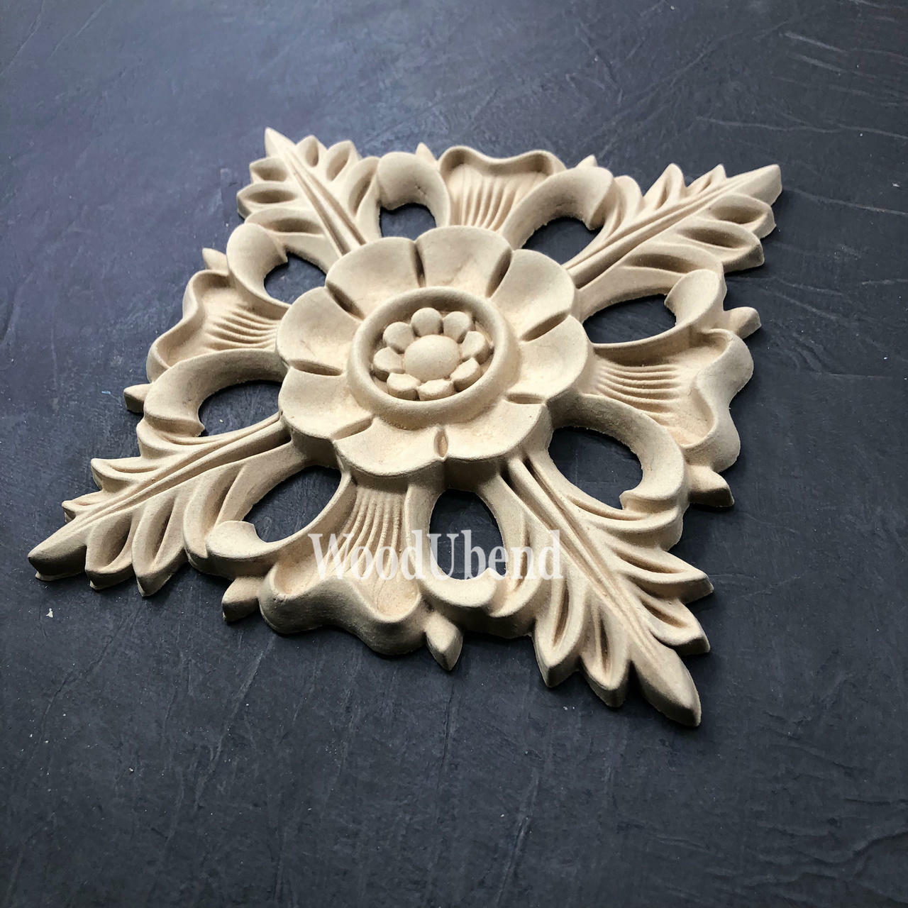 WoodUBend Floral Applique #1352.18 (Set of 2) is the perfect mouldable embellishment for any project!
Image shows one of the Floral Applique #1352.18 Set of 2, staged on an angle on a black background.