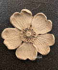 WoodUBend Floral Applique #1479 (Set of 5) is the perfect mouldable embellishment for any project!
Image shows one Floral Applique #1479 staged flat on a black background.