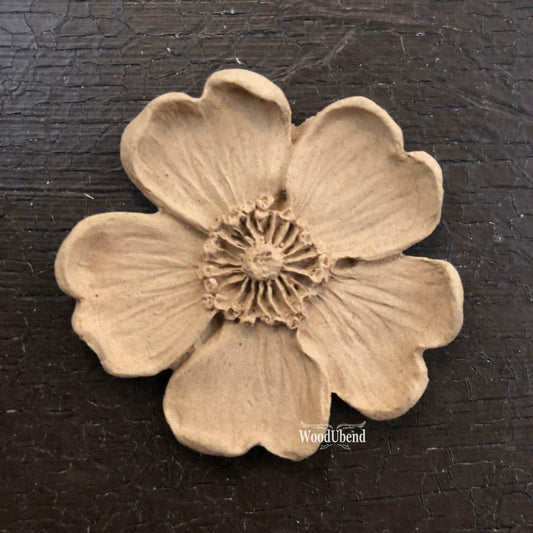 WoodUBend Floral Applique #1479 (Set of 5) is the perfect mouldable embellishment for any project!
Image shows one Floral Applique #1479 staged flat on a black background.