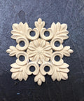 WoodUBend Floral Applique #2427 (set of 2) is the perfect mouldable embellishment for any project!
Image shows one of the Floral Applique #2427 staged flat on a black background.