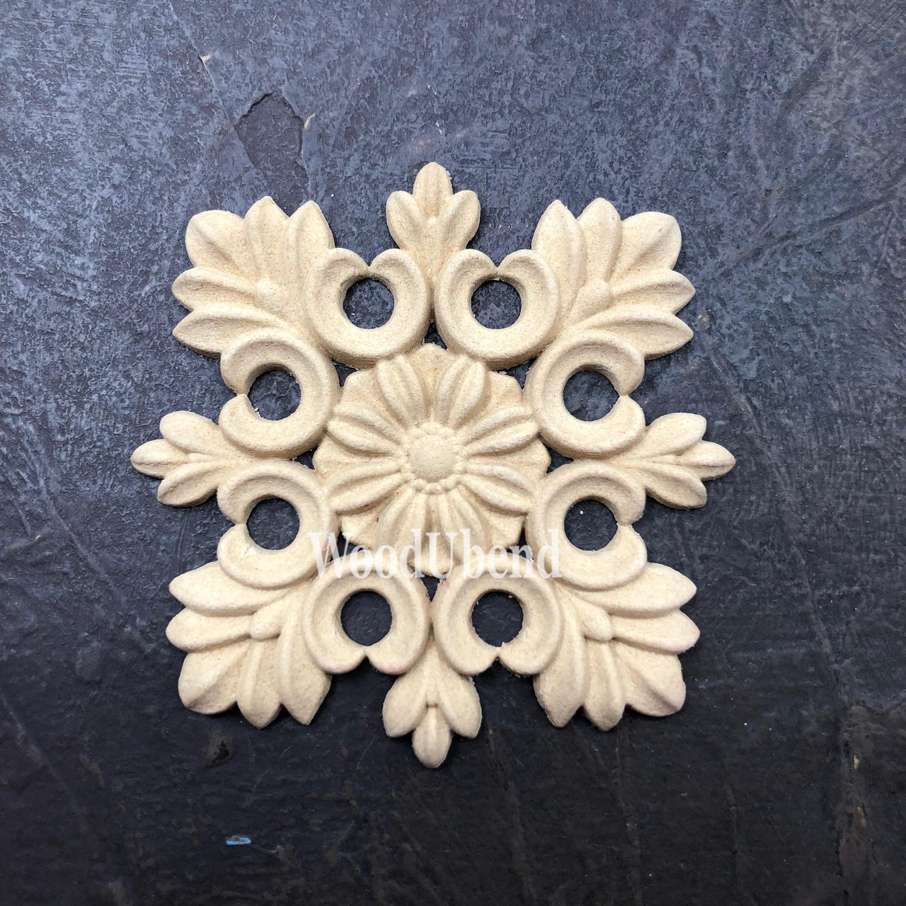 WoodUBend Floral Applique #2427 (set of 2) is the perfect mouldable embellishment for any project!
Image shows one of the Floral Applique #2427 staged flat on a black background.