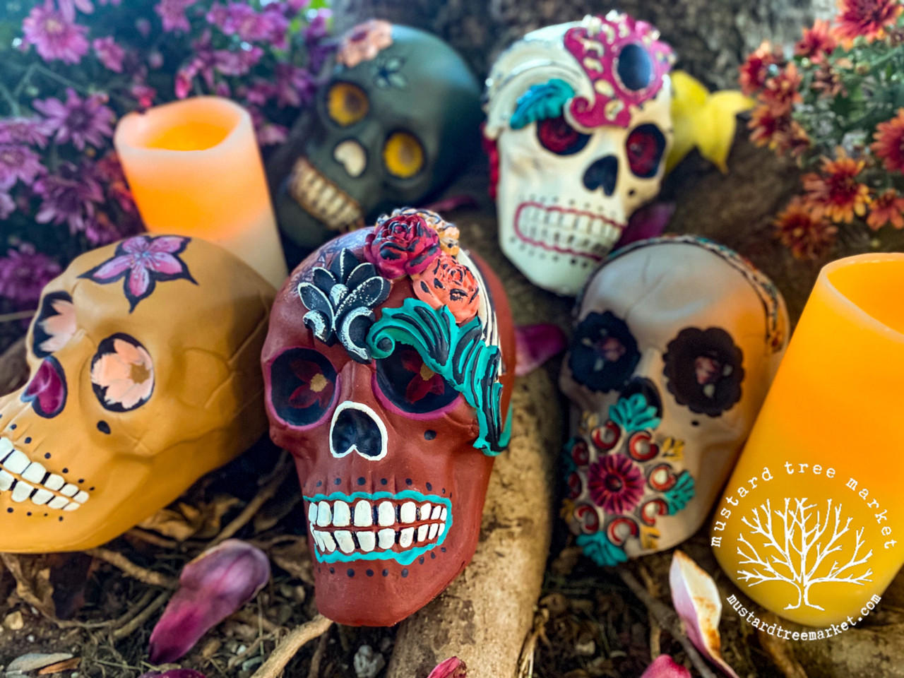 WoodUBend Floral Applique #465 (set of 5) is the perfect moldable embellishment for any project!
An image of a bundle of Skulls in a skull candy design, the skull in the center has Floral Applique #465 on the top. Staged outside with flowers and yellow candles.