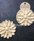 WoodUBend Floral Applique #6098 (Set of 2) is the perfect mouldable embellishment for any project!
An image of the Floral Applique #6098 (Set of 2), one being in the packaging and the other without. Staged on a a black crinkled background.