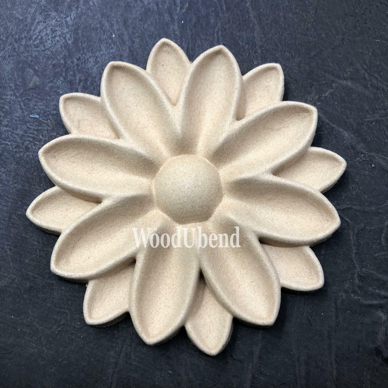 WoodUBend Floral Applique #6098 (Set of 2) is the perfect mouldable embellishment for any project!
The round Floral Applique #6098 (Set of 2) staged flat on a black background.