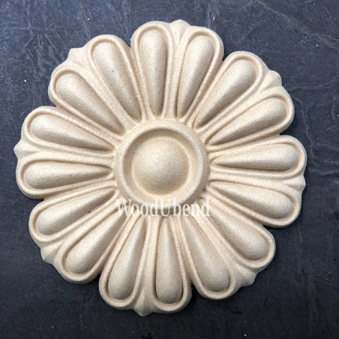 WoodUBend Floral Applique #6099 (Set of 2) is the perfect mouldable embellishment for any project!
The round Floral Applique #6099 (Set of 2) staged flat on a black background.