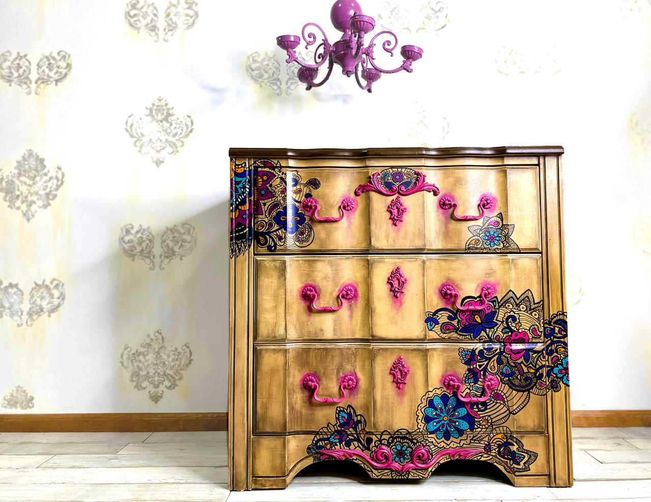 WoodUBend Keyhole #1147 (Set of 5) is the perfect mouldable embellishment for any project!
Dresser lightly stained in Tobacco Road VooDoo Gel Stain along with Latin Floral Transfer along the drawers and body of the dresser. The Keyhole #1147 in hot pink going down the center of the piece, both the hardware and applique are with a dripping paint effect.
