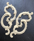 WoodUBend Ring Applique #1520 (set of 2) is the perfect mouldable embellishment for any project! 2 scroll style  wooden appliques facing different directions and angled to the right. These appliques are not in the package.