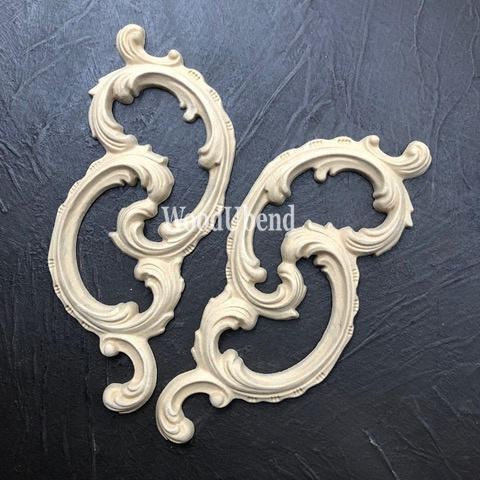 WoodUBend Ring Applique #1520 (set of 2) is the perfect mouldable embellishment for any project! 2 scroll style  wooden appliques facing different directions and angled to the right. These appliques are not in the package.